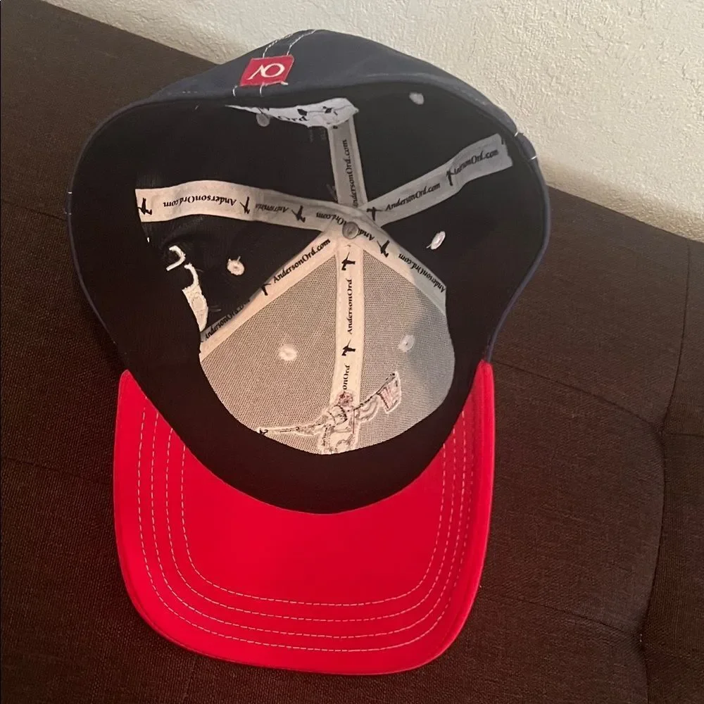 #1063+Unisex Red and White Baseball Cap W/ Embroidered Design